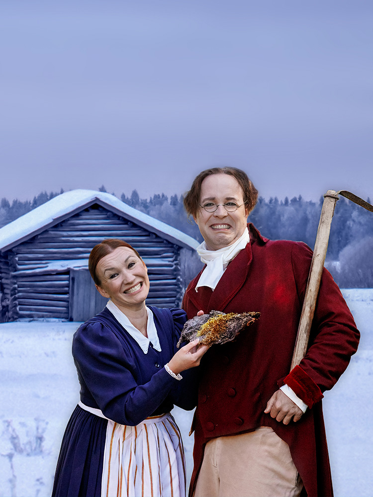 Fotografi. Fredrika och Johan Ludvig Runeberg står framför en snötäckt lada och ler forcerat.